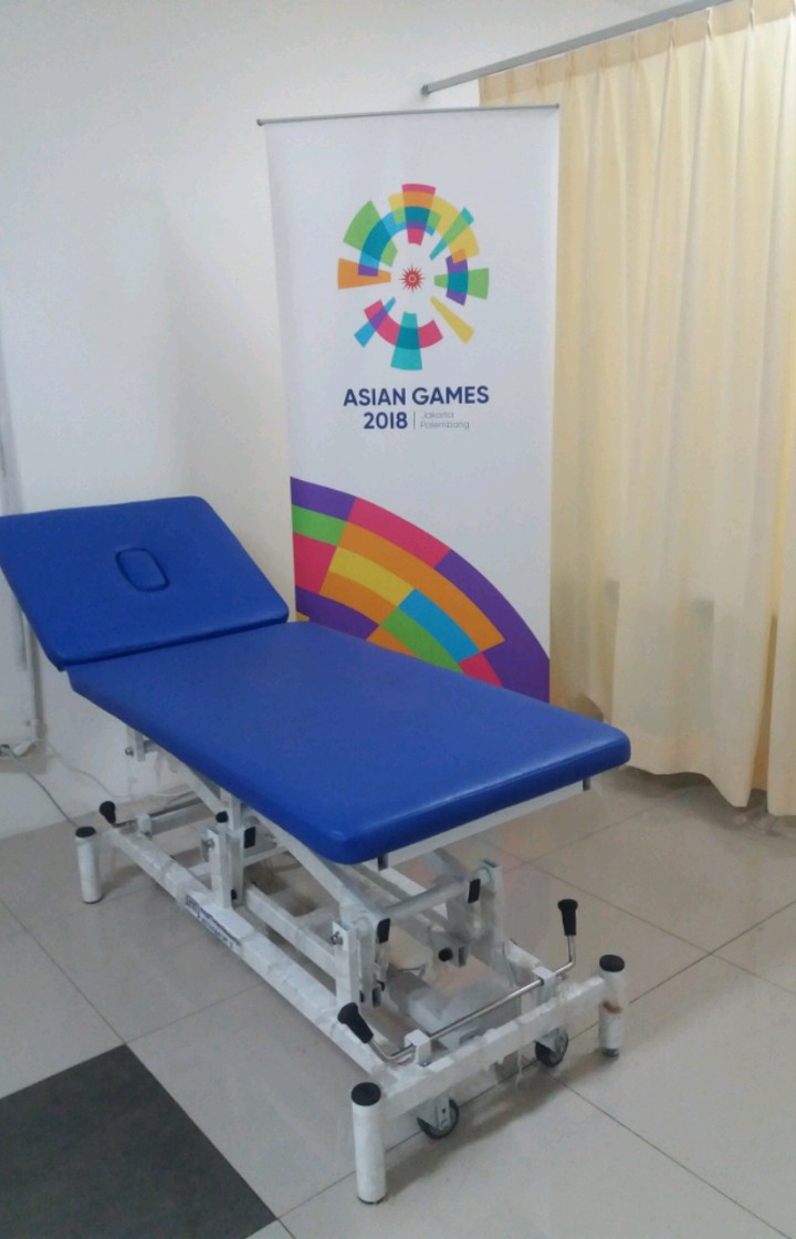 DMT2E-TWO-SECTION-MANUAL-THERAPY-BED-ELECTRIC.jpg